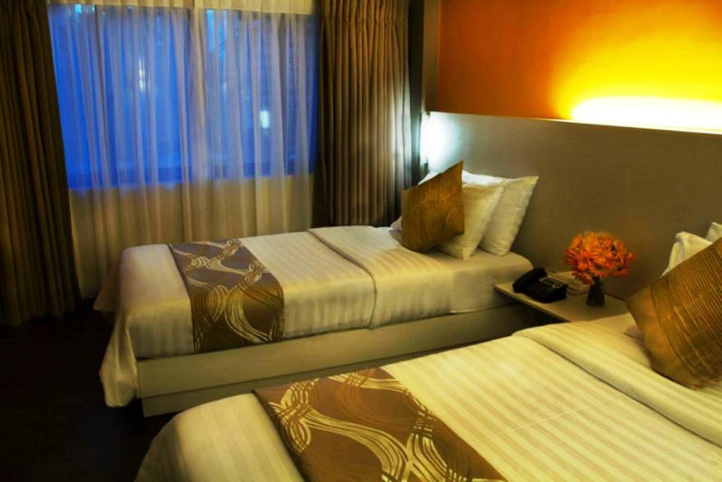 Двухместный (Улучшенный двухместный номер с 2 отдельными кроватями) отеля Pillows Hotel Cebu, Себу
