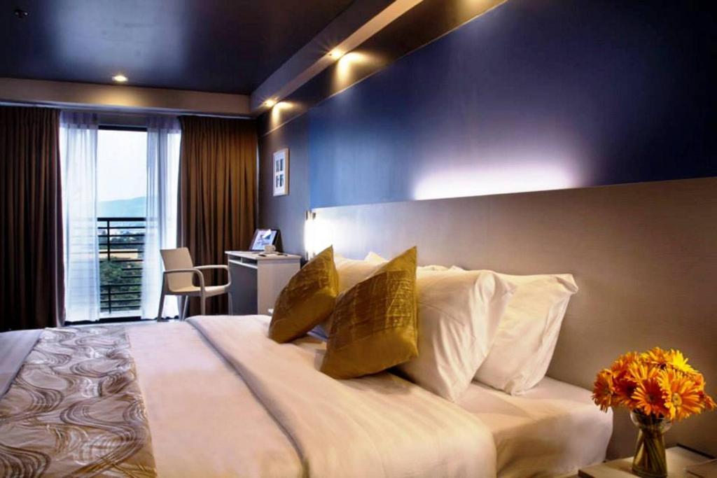 Четырехместный (Четырехместный номер «Премиум») отеля Pillows Hotel Cebu, Себу