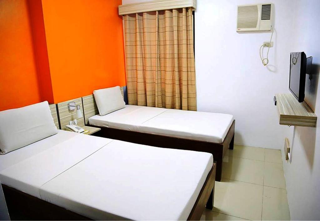 Двухместный (Стандартный двухместный номер с 2 отдельными кроватями «Улей») отеля Travelbee Business Inn, Себу