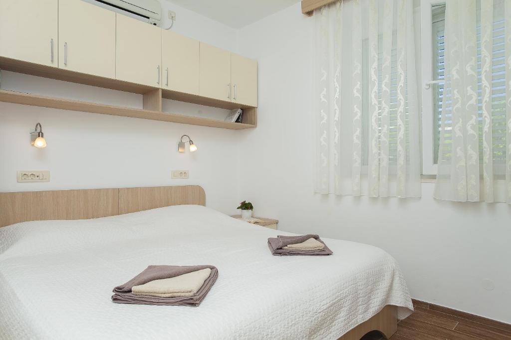 Двухместный (Двухместный номер с 1 кроватью или 2 отдельными кроватями) апартамента Pension Lovrić, Лумбарда