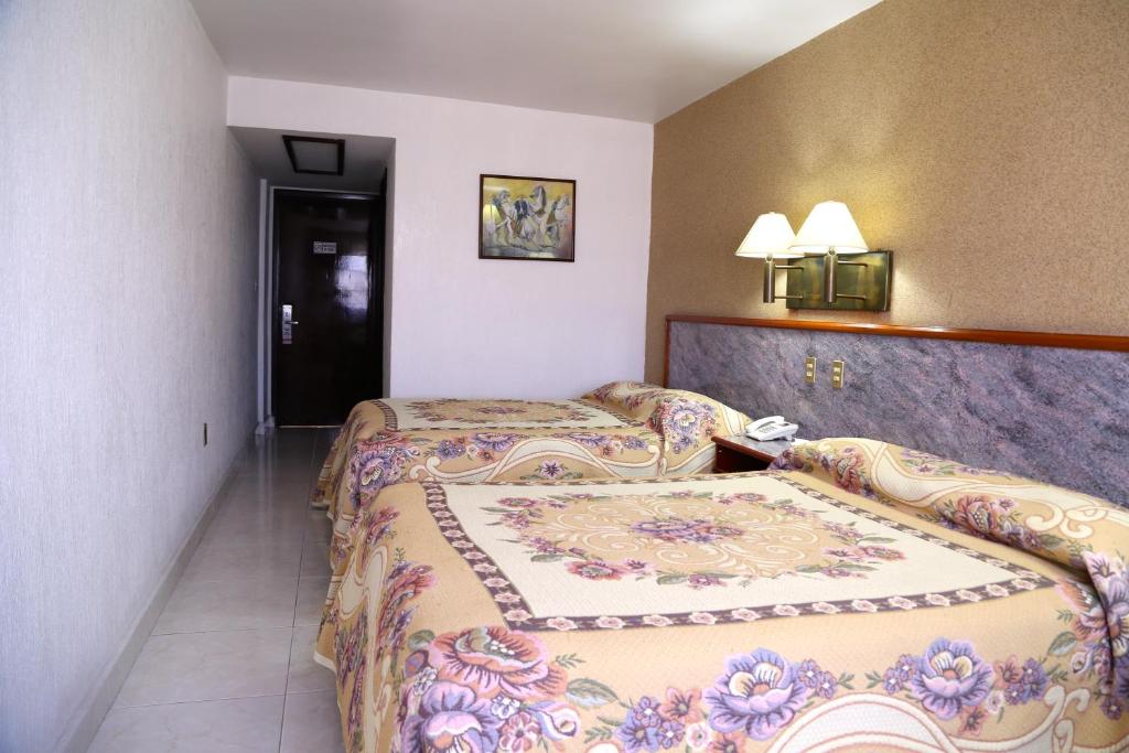 Двухместный (Двухместный номер с 2 двуспальными кроватями) отеля Hotel Baluarte, Веракрус