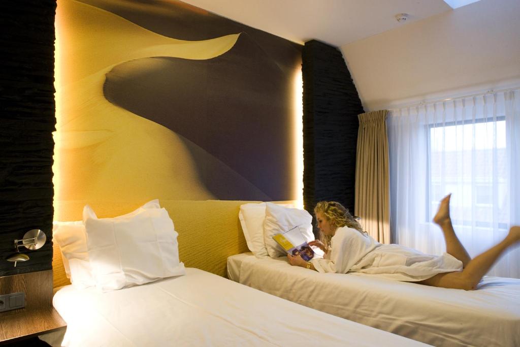 Двухместный (Двухместный номер Делюкс с 2 отдельными кроватями) отеля Boetiek Hotel Plein Vijf, Эйндховен