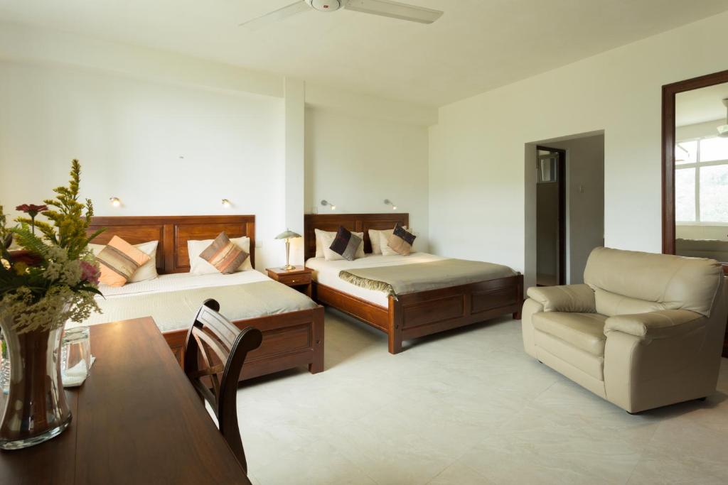 Двухместный (Улучшенный двухместный номер с 1 кроватью и видом на горы) отеля Ravana Heights, Элла
