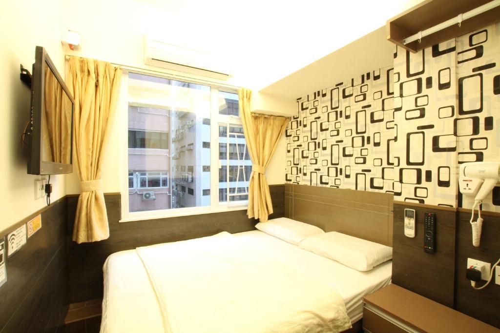Двухместный (Улучшенный двухместный номер с 1 кроватью, вид на город) гостевого дома Tai Wah Boutique Hostel, Гонконг (город)