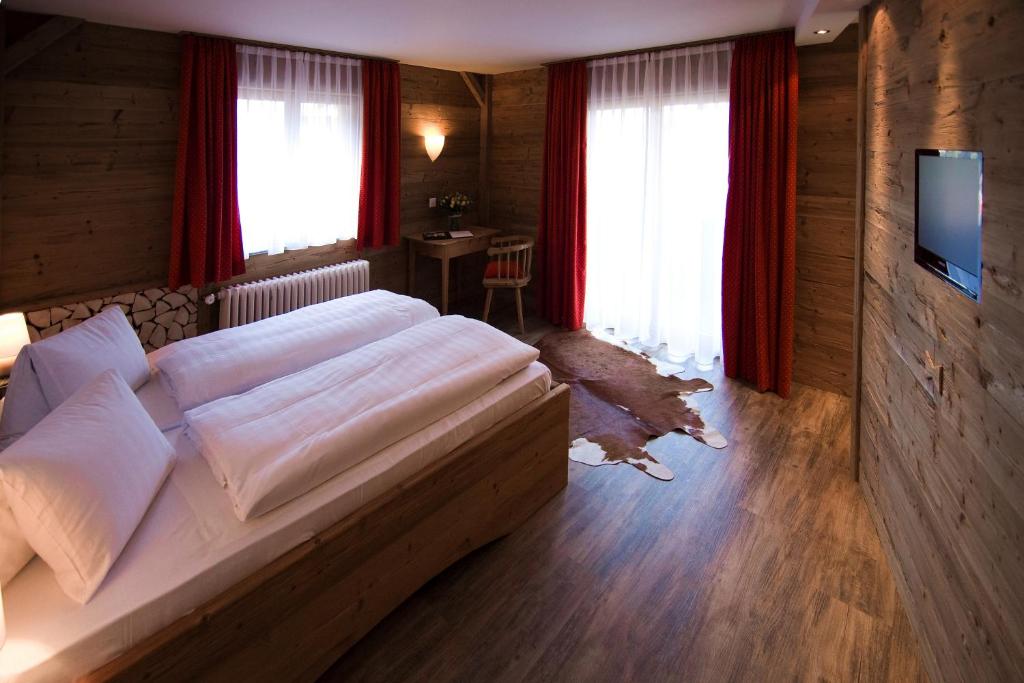 Двухместный (Улучшенный двухместный номер с 1 кроватью) отеля Arosa Vetter Hotel, Ароза