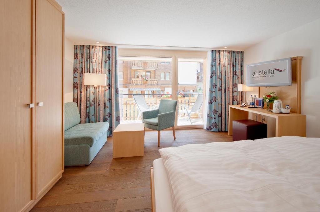 Двухместный (Двухместный номер с 1 кроватью и панорамным видом на гору Маттерхорн) отеля Hotel Aristella Swissflair, Церматт