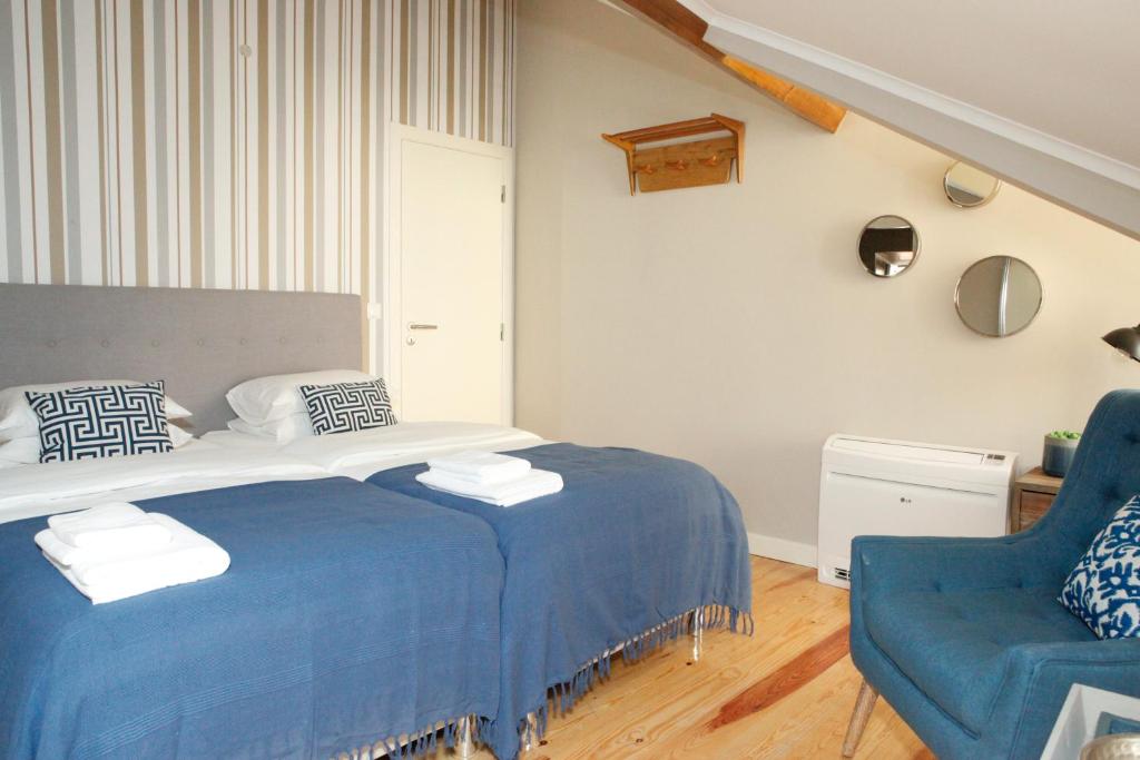Двухместный (Большой двухместный номер с 1 кроватью или 2 отдельными кроватями) отеля Flores Guest House, Лиссабон