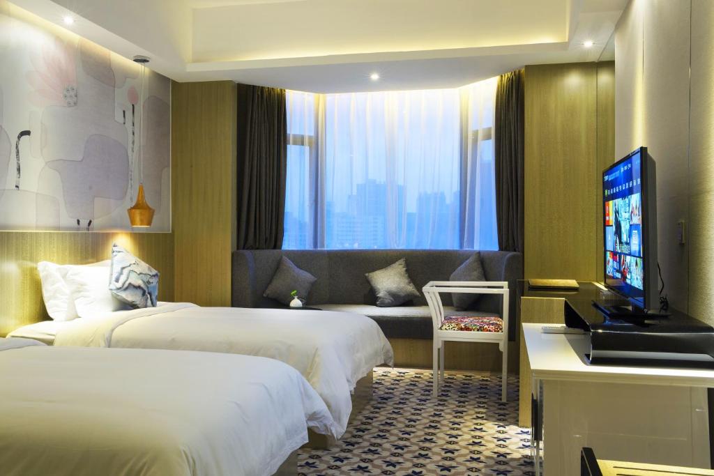 Двухместный (Улучшенный двухместный номер с 2 отдельными кроватями) отеля Paco Hotel - Guangzhou Tianpingjia Metro Branch, Гуанчжоу