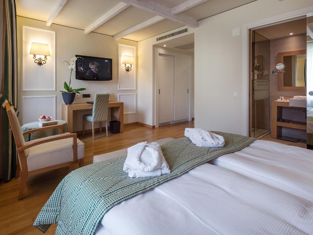 Двухместный (Шикарный двухместный номер «Комфорт» с 1 кроватью) отеля Kurhaus Cademario Hotel & Spa, Сесса