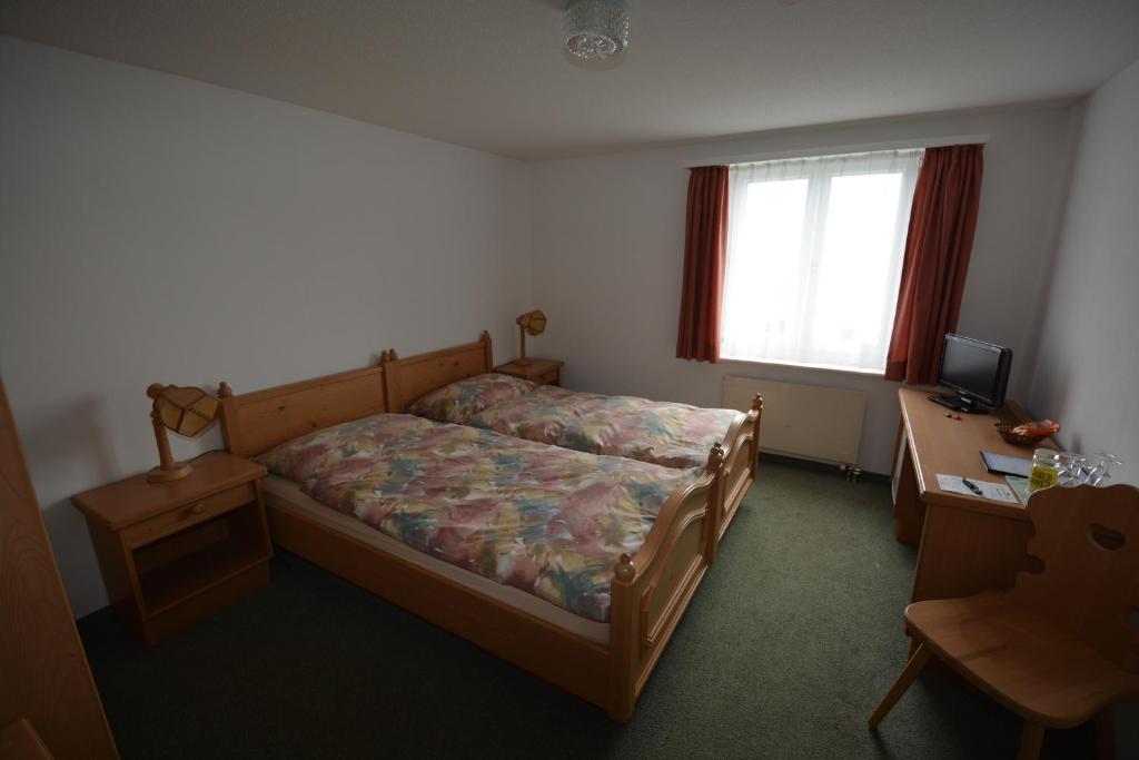Двухместный (Двухместный номер с 1 кроватью или 2 отдельными кроватями) отеля Aparthotel Edy Bruggmann AG, Флумзерберг