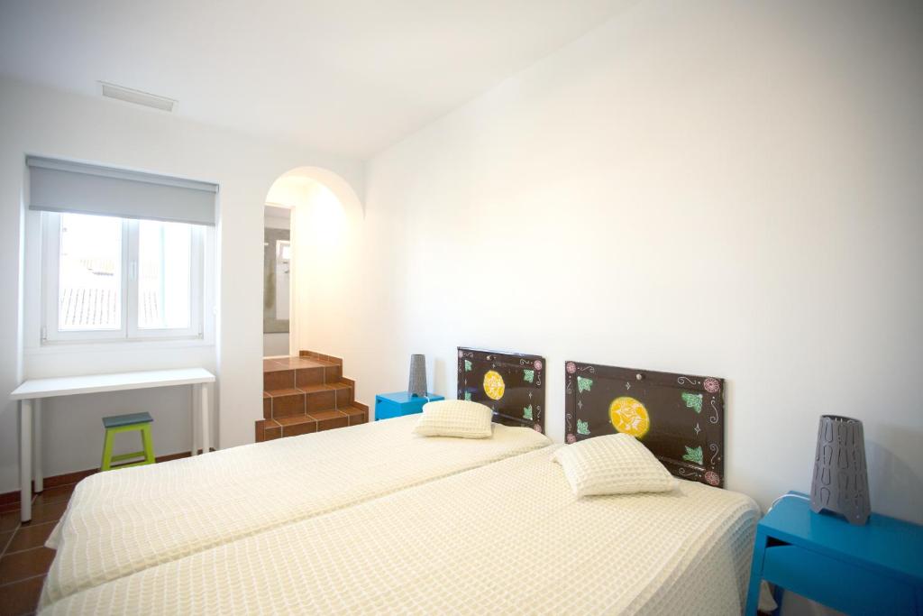 Двухместный (Двухместный номер с 2 отдельными кроватями) хостела HI Hostel Evora - Pousada de Juventude, Эвора