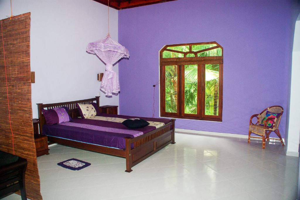 Двухместный (Двухместный номер Делюкс с 1 кроватью и дополнительной кроватью) отеля King Coconut Lodge, Габарадува