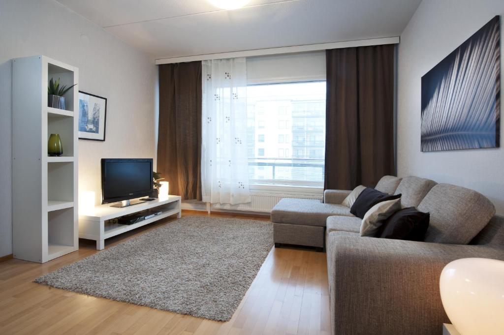 Апартаменты (Апартаменты с 3 спальнями и сауной) апартамента Kotimaailma Apartments Rovaniemi, Рованиеми