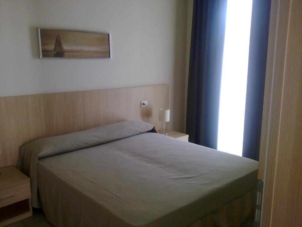 Апартаменты (Апартаменты с 1 спальней (4 взрослых) - Пляжный пакет услуг) апарт-отеля Residence Belmare, Римини