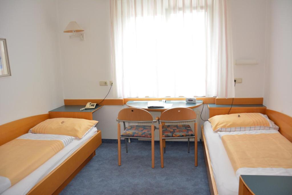 Двухместный (Двухместный номер с 2 отдельными кроватями) отеля Hotel Waldheimat, Линц