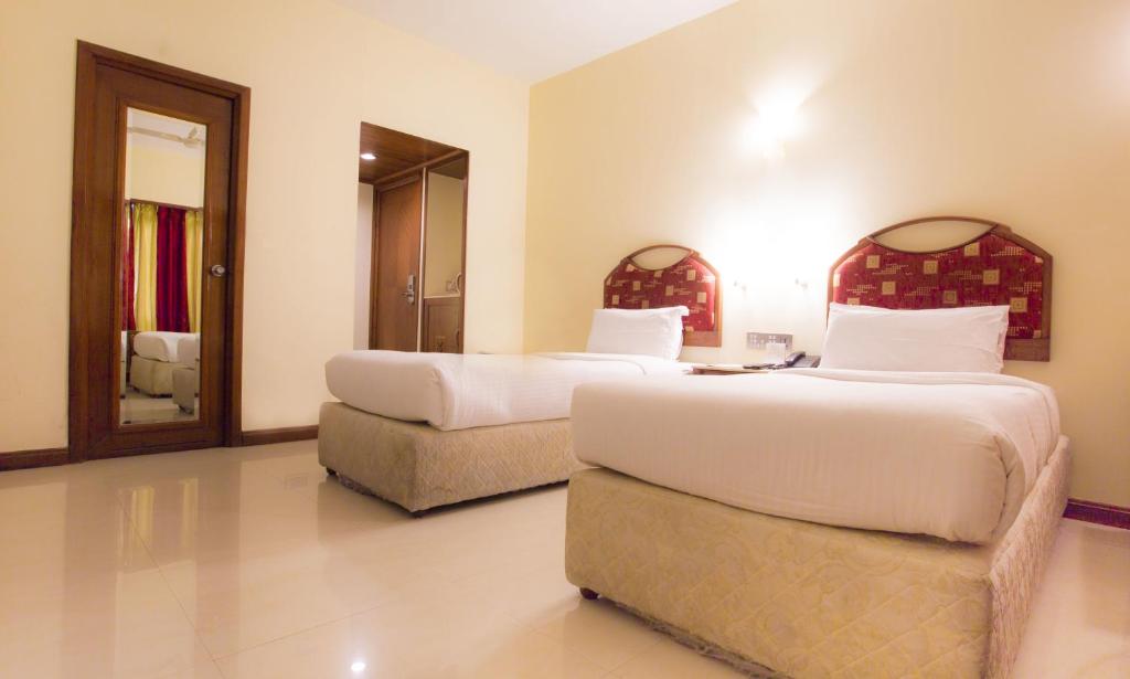 Двухместный (Улучшенный двухместный номер с 1 кроватью или 2 отдельными кроватями) отеля Hotel Airport International, Мумбай