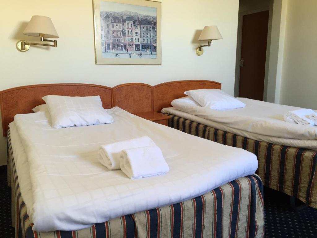 Двухместный (Бюджетный двухместный номер с 2 отдельными кроватями) отеля First Hotel Statt, Карлскруна