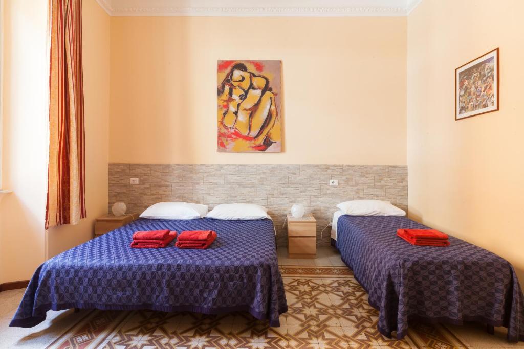 Четырехместный (Четырехместный номер с собственной ванной комнатой вне номера) гостевого дома Furio Camillo, Рим