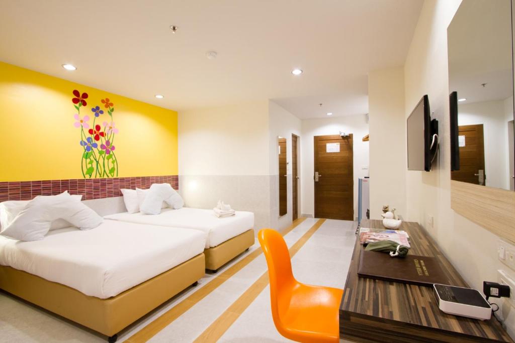 Двухместный (Двухместный номер Делюкс с 2 отдельными кроватями, вид на бассейн) отеля Grand Bella, Паттайя