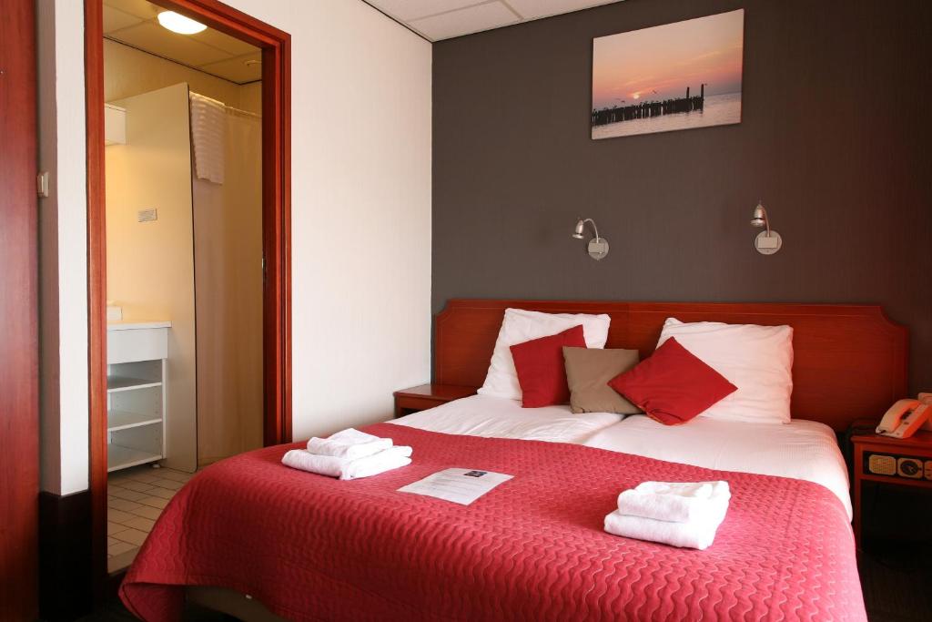 Двухместный (Двухместный номер с 2 отдельными кроватями и видом на город) отеля Hotel De Leugenaar, Берген-оп-Зом