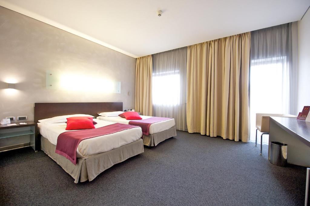 Двухместный (Стандартный двухместный номер с 2 отдельными кроватями) отеля Mercure Palermo Centro, Палермо