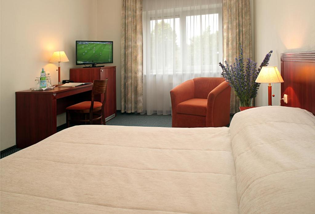 Двухместный (Стандартный двухместный номер с 1 кроватью или 2 отдельными кроватями) отеля Hotel Promenada, Клайпеда