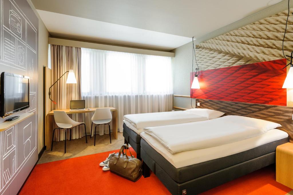 Двухместный (Стандартный двухместный номер с 2 отдельными кроватями) отеля ibis Innsbruck, Инсбрук