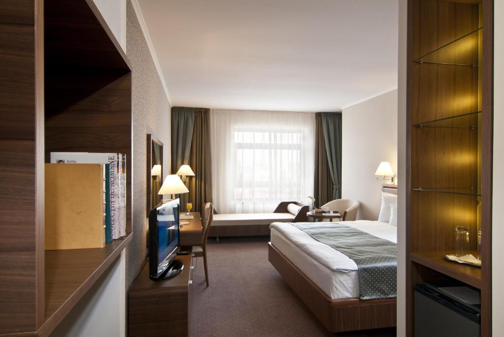 Двухместный (Номер с 1 кроватью размера «king-size» и 1 диваном-кроватью) отеля Ramada Hotel Cluj, Клуж-Напока