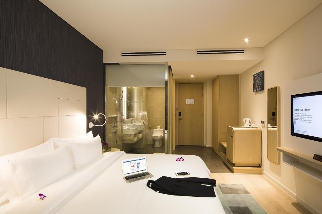 Двухместный (Представительский двухместный номер Делюкс с 1 кроватью или 2 отдельными кроватями) отеля Liberty Central Saigon Riverside Hotel, Хошимин