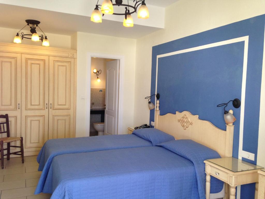 Двухместный (Бюджетный двухместный номер с 2 отдельными кроватями - Без вида) отеля Pelican Hotel, Миконос