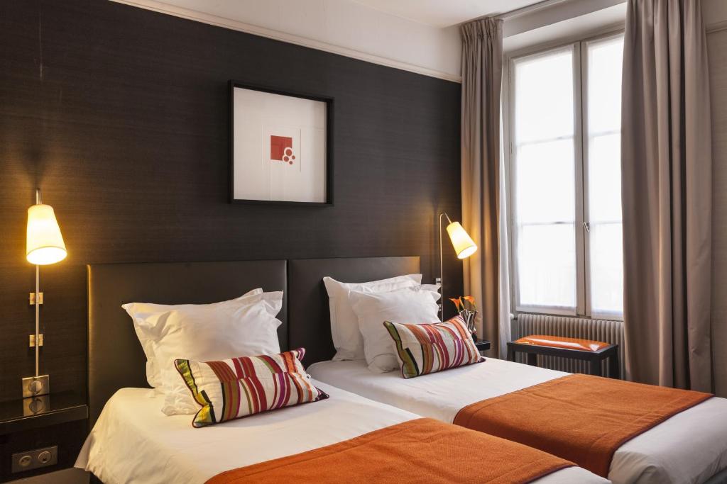 Двухместный (Стандартный двухместный номер с 2 отдельными кроватями) отеля Hôtel Duo, Париж