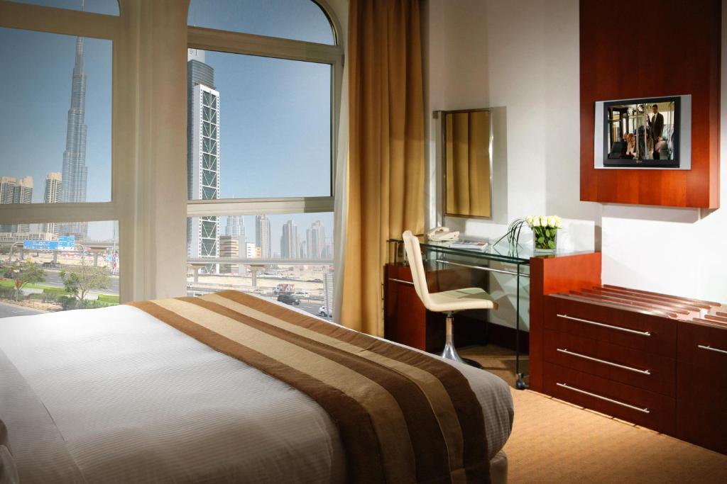 Сьюит (Люкс «Бурдж» – Кровать размера «king-size») апарт-отеля Villa Rotana - Dubai, Дубай