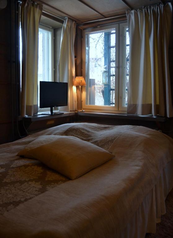 Двухместный (Двухместный номер с 1 кроватью или 2 отдельными кроватями) отеля Lossiranta Lodge, Савонлинна