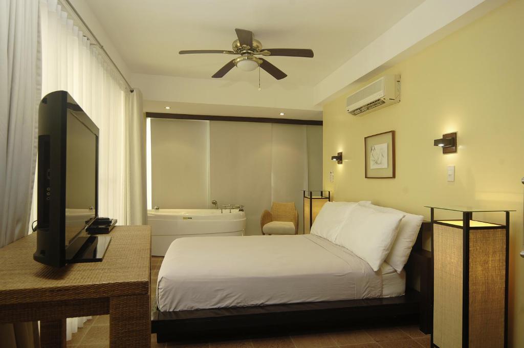 Четырехместный (Апартаменты в пентхаусе) отеля Boracay SandCastles The Apartments, Боракай