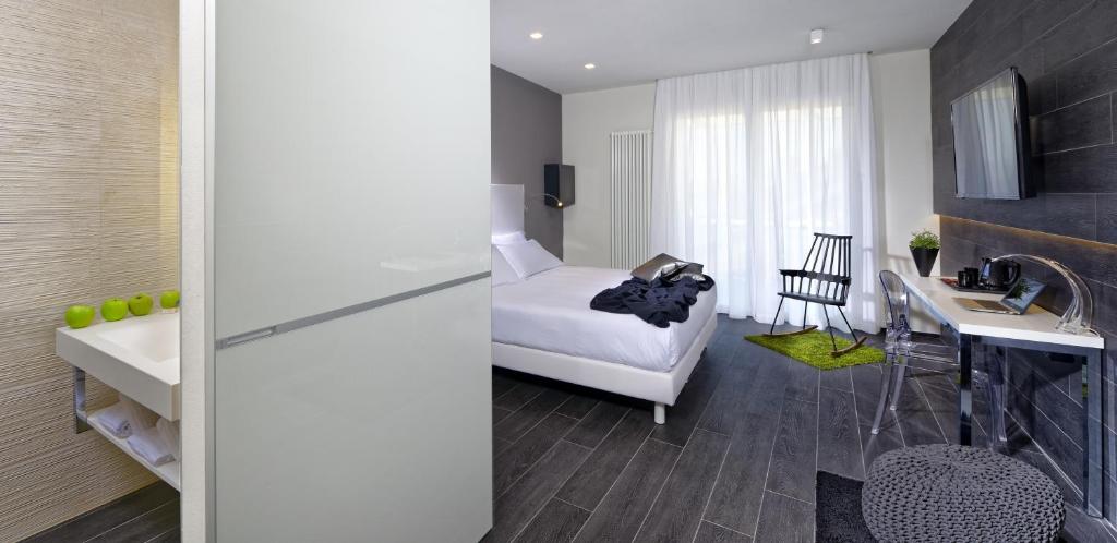 Двухместный (Двухместный номер Делюкс с 1 кроватью или 2 отдельными кроватями) отеля Hotel Metropolitan, Болонья