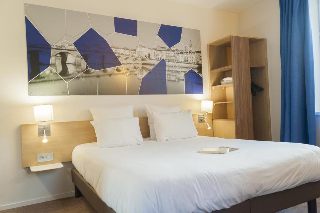 Двухместный (Уютный двухместный номер с 1 кроватью) отеля Brit Hotel Mâcon Centre Gare, Макон
