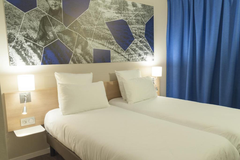 Двухместный (Уютный двухместный номер с 2 отдельными кроватями) отеля Brit Hotel Mâcon Centre Gare, Макон