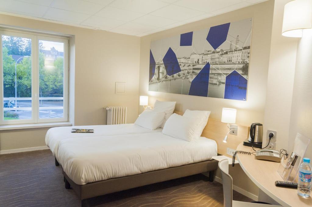Двухместный (Двухместный номер «Премиум» с 2 отдельными кроватями) отеля Brit Hotel Mâcon Centre Gare, Макон