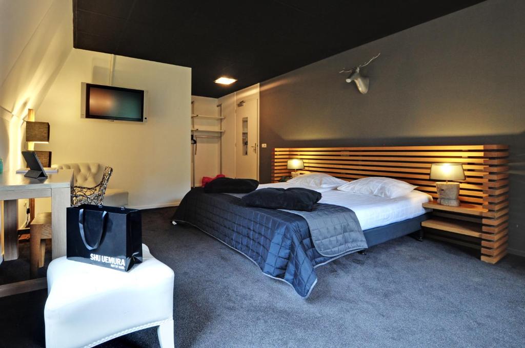 Двухместный (Двухместный номер Делюкс с 2 отдельными кроватями) отеля Boetiek Hotel BonAparte Lochem, Арнем