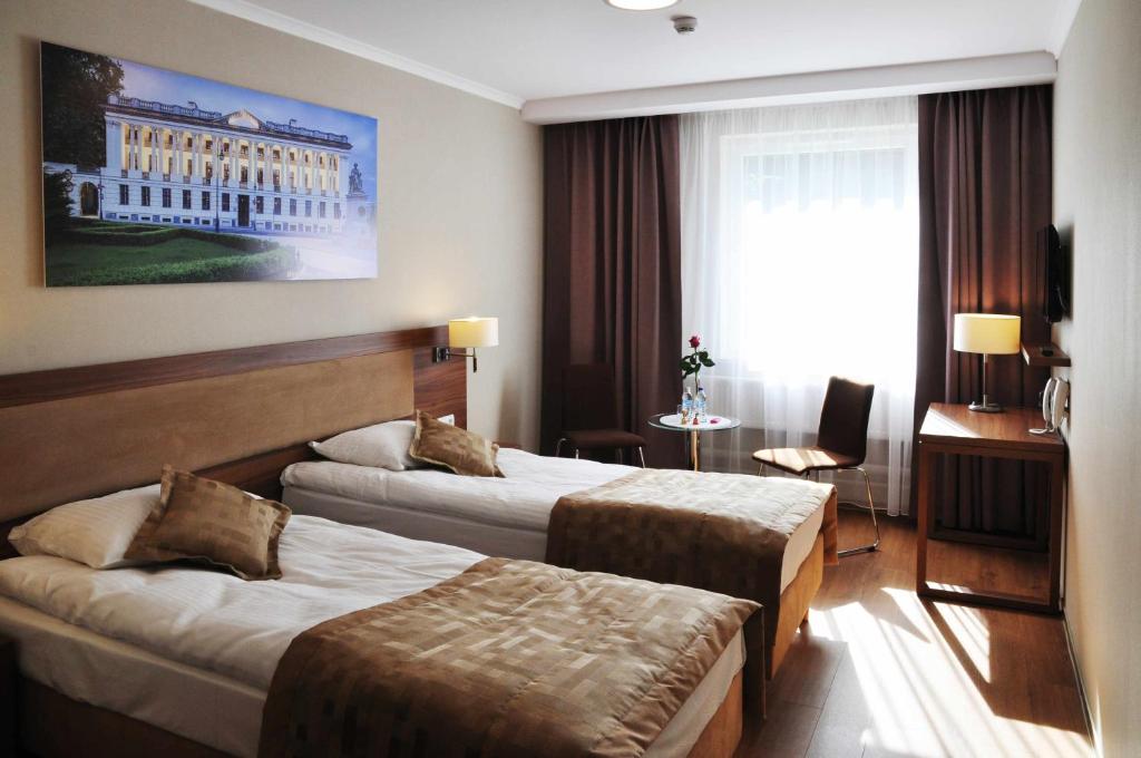 Двухместный (Двухместный номер Делюкс с 2 отдельными кроватями) отеля Hotel Topaz Poznań Centrum, Познань