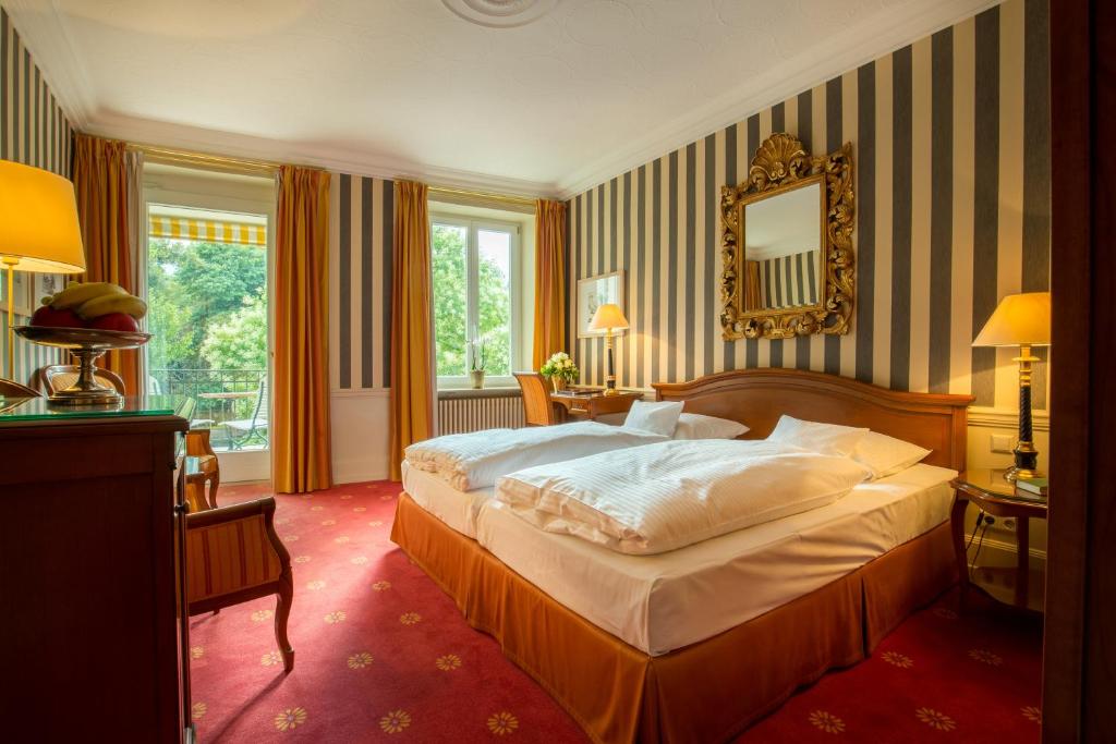 Двухместный (Улучшенный двухместный номер с 1 кроватью и видом на парк) отеля Atlantic Parkhotel, Баден-Баден