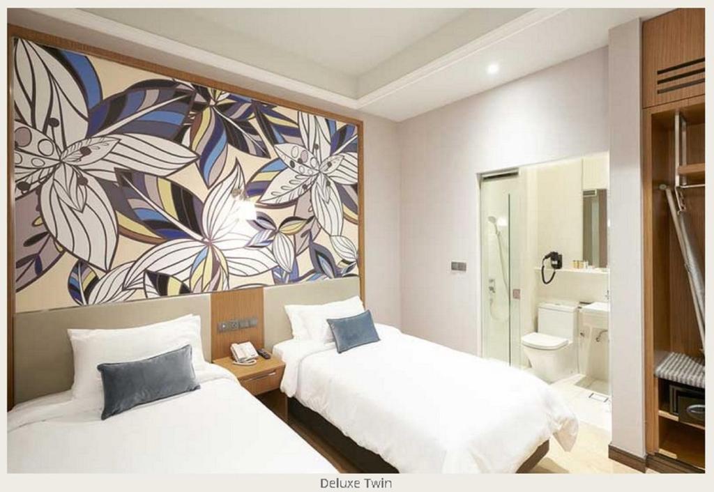 Двухместный (Двухместный номер Делюкс с 2 отдельными кроватями) отеля Hotel Bencoolen @ Hong Kong Street, Сингапур (город)