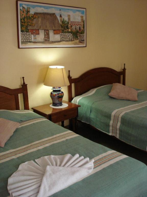 Двухместный (Двухместный номер с 2 двуспальными кроватями) отеля Hotel Real Del Mayab, Плая-дель-Кармен