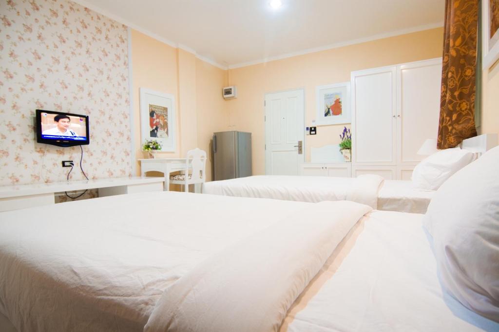 Двухместный (Стандартный двухместный номер с 1 кроватью или 2 отдельными кроватями (5 этаж)) отеля Boonsiri, Сисакет