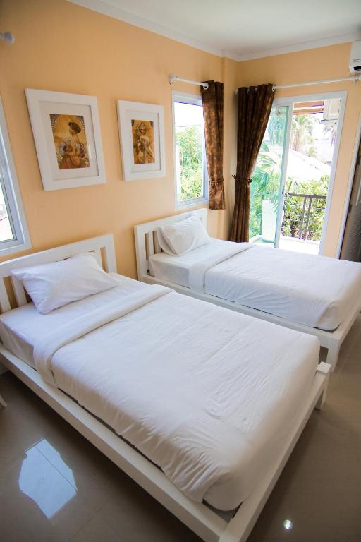 Двухместный (Стандартный двухместный номер с 1 кроватью или 2 отдельными кроватями (4 этаж)) отеля Boonsiri, Сисакет