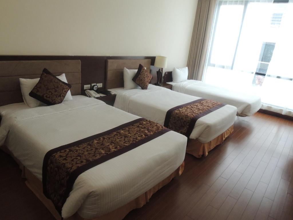Двухместный (Улучшенный двухместный номер с 2 отдельными кроватями) отеля Muong Thanh Holiday Quang Binh Hotel, Донгхой