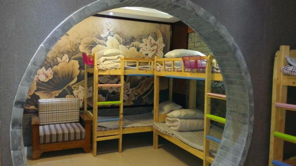 Номер (Для граждан материкового Китая — Кровать в шестиместном общем номере для женщин) хостела Lanzhou Up in the Wing Youth Hostel, Ланьчжоу