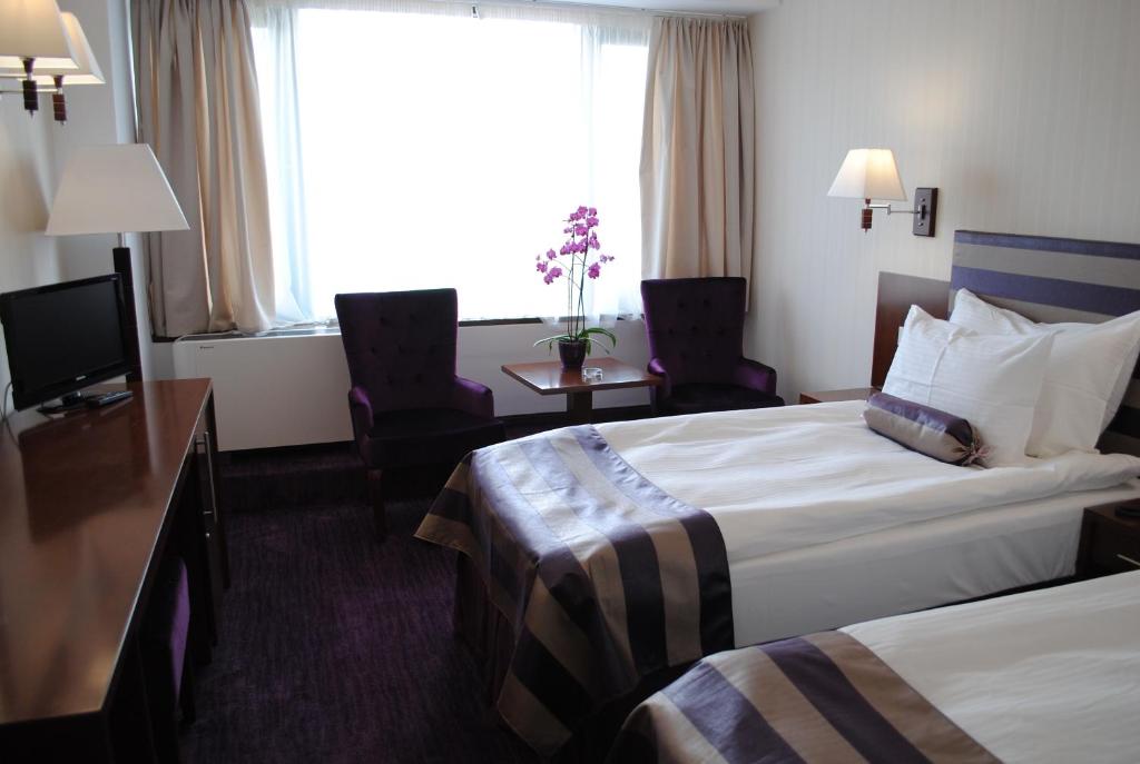 Двухместный (Стандартный двухместный номер с 2 отдельными кроватями) отеля Grand Hotel Napoca, Клуж-Напока