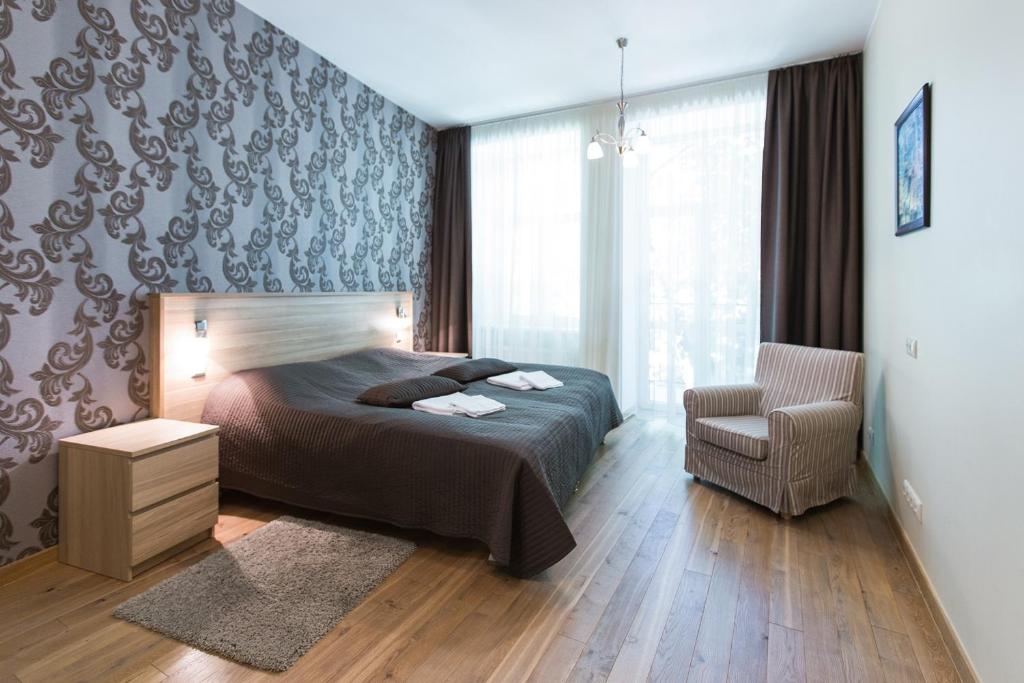 Апартаменты (Уютные апартаменты с 1 спальней и балконом), Riga Lux Apartments - Ernesta