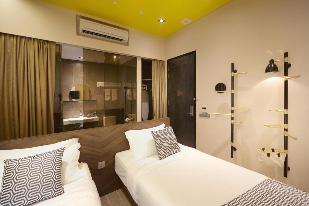 Двухместный (Двухместный номер Делюкс с 2 отдельными кроватями) отеля Hotel Yan, Сингапур (город)